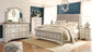Realyn California King Sleigh Bed with Mirrored Dresser, Chest and Nightstand Smyrna Furniture Outlet
