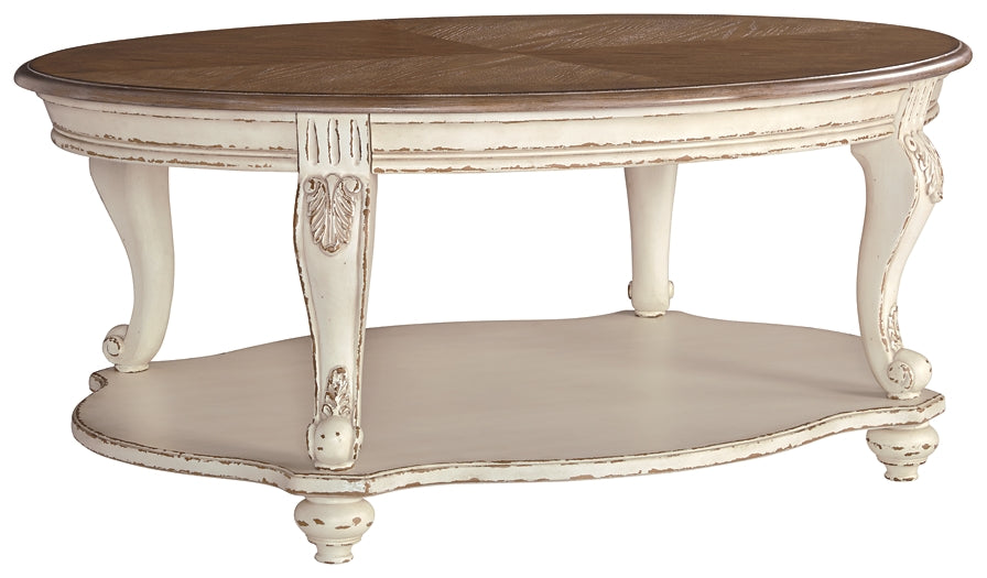 Realyn Oval Cocktail Table Smyrna Furniture Outlet