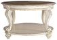 Realyn Oval Cocktail Table Smyrna Furniture Outlet
