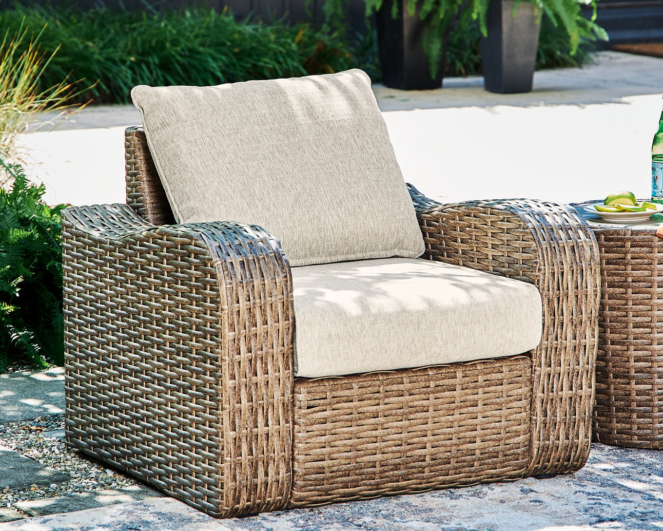 Sandy Bloom Outdoor Lounge Chair and Ottoman Smyrna Furniture Outlet