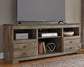 Trinell LG TV Stand w/Fireplace Option Smyrna Furniture Outlet