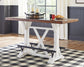Valebeck Counter Height Dining Table and 2 Barstools Smyrna Furniture Outlet