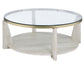 Wanda 42″ Round Glass Top Coffee Table with Casters