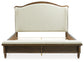 Sturlayne King Upholstered Panel Bed with Mirrored Dresser and Nightstand