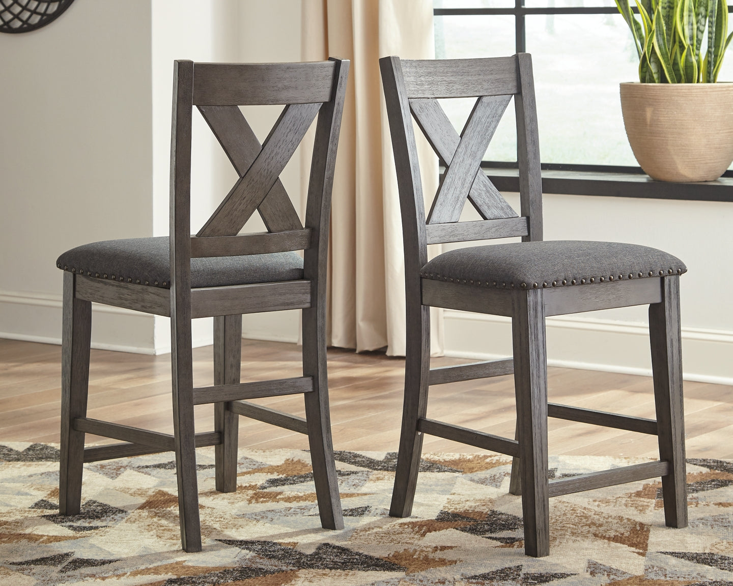 Caitbrook Counter Height Dining Table and 4 Barstools Smyrna Furniture Outlet