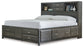 Caitbrook Queen Storage Bed with 8 Storage Drawers with Mirrored Dresser, Chest and Nightstand Smyrna Furniture Outlet