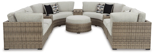 Calworth Outdoor 9-Piece Sectional with Ottoman Smyrna Furniture Outlet