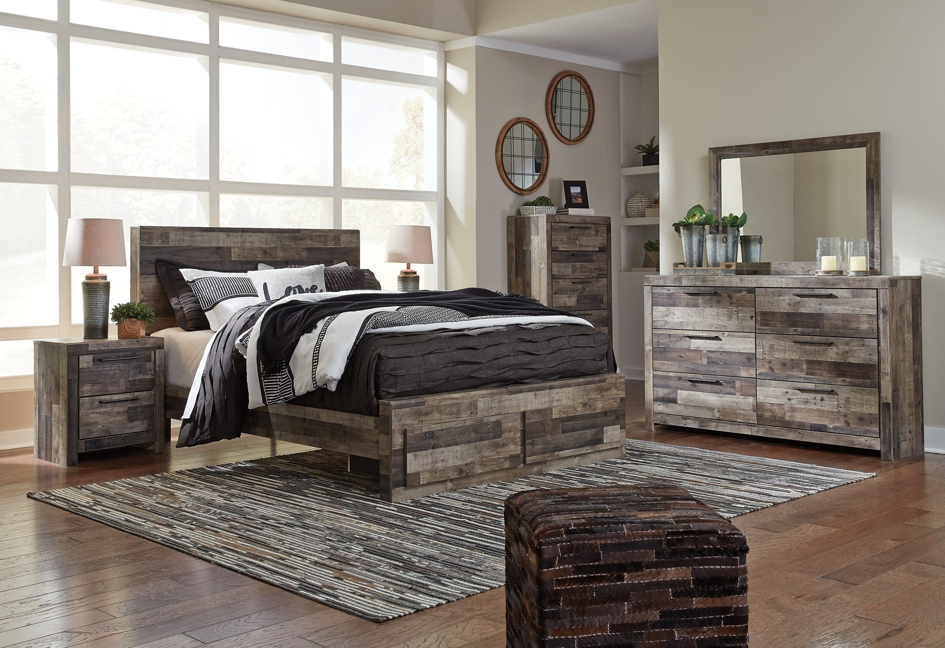 Derekson Queen Panel Bed with 2 Storage Drawers with Mirrored Dresser, Chest and 2 Nightstands Smyrna Furniture Outlet