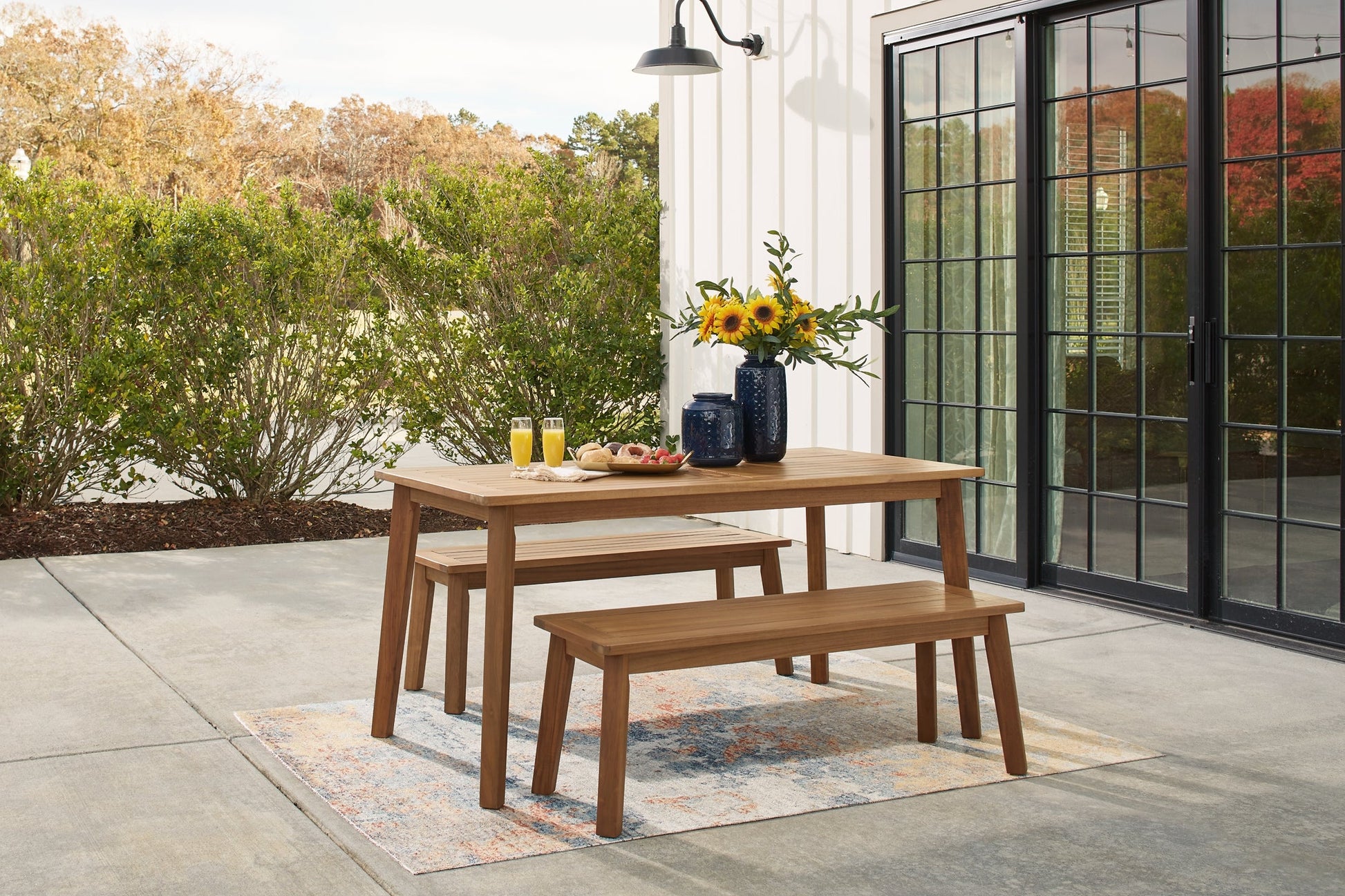 Janiyah Outdoor Dining Table and 2 Benches Smyrna Furniture Outlet